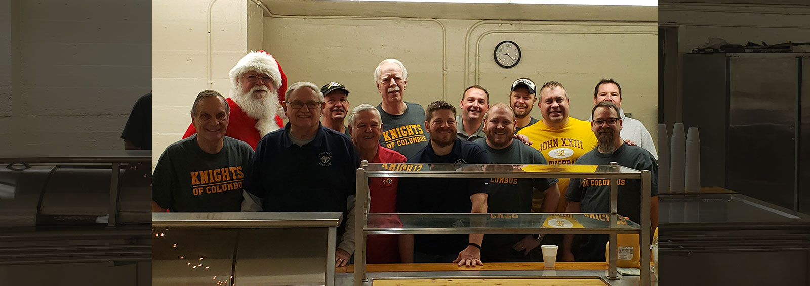 Council members serving a community meal